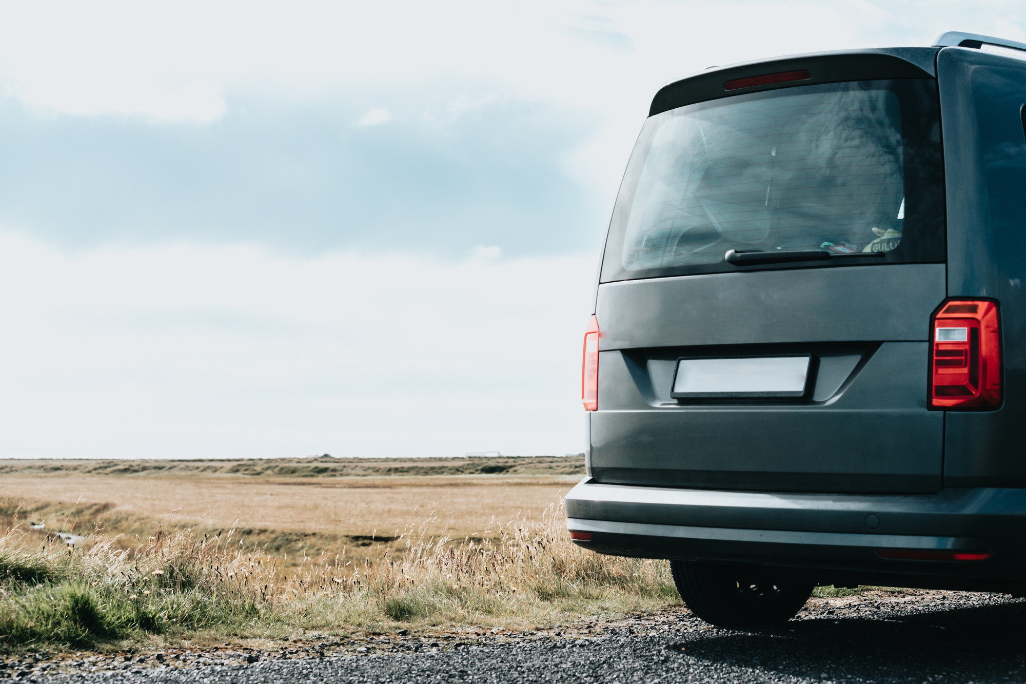 Caravan van with copy space parked on the wild lands during a road trip on iceland.Vanlife - live in